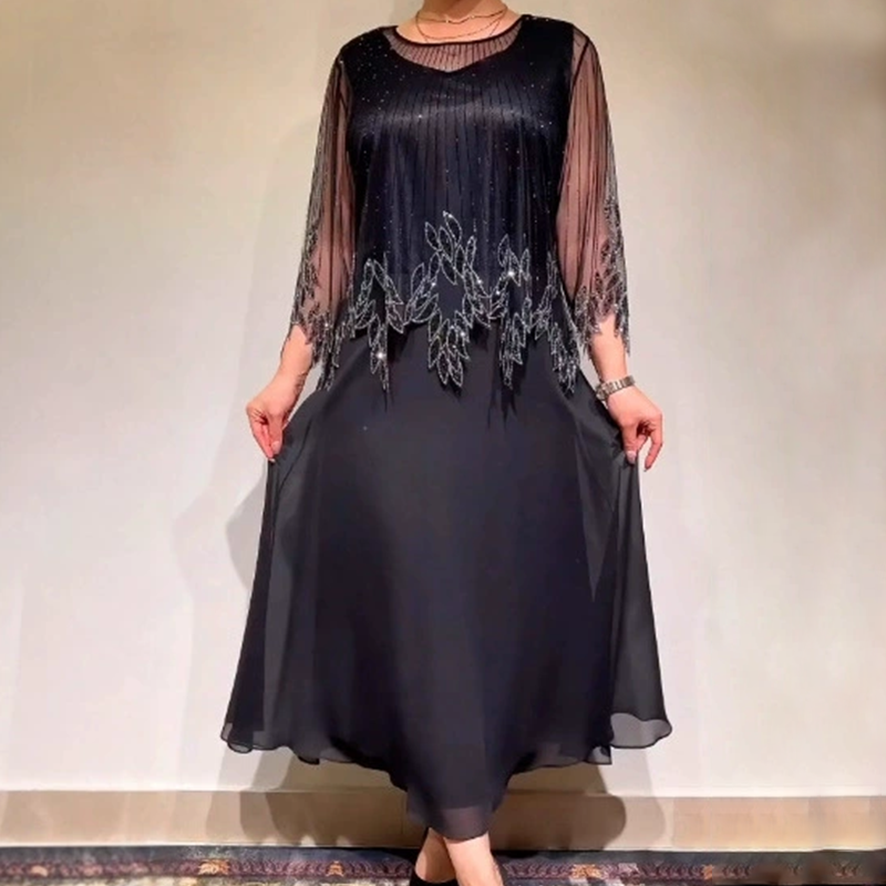 Eliza – Elegant kjole med skinnende overlay-lag