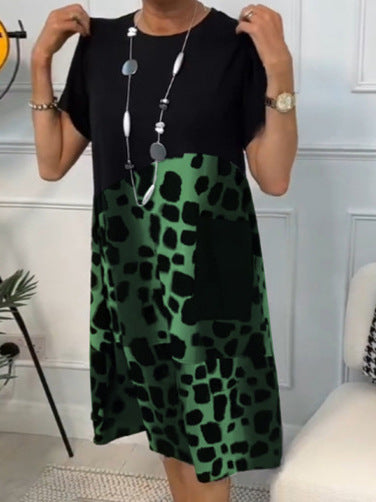 Hansine – løs kjole med print og lommer