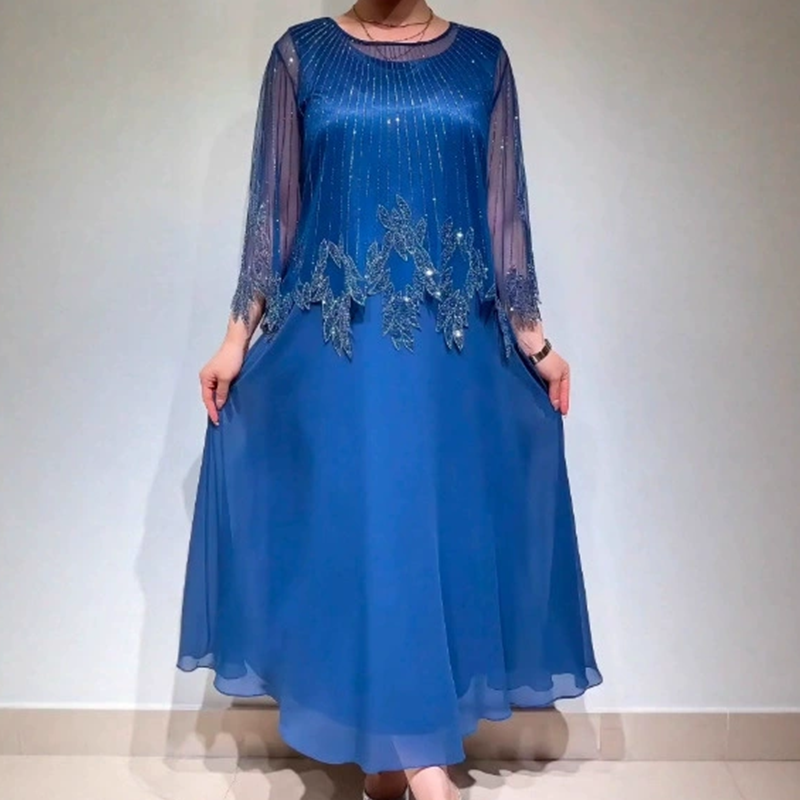 Eliza – Elegant kjole med skinnende overlay-lag