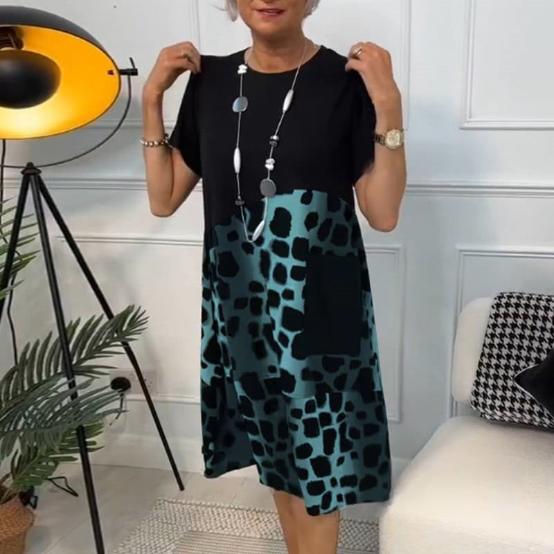 Hansine – løs kjole med print og lommer